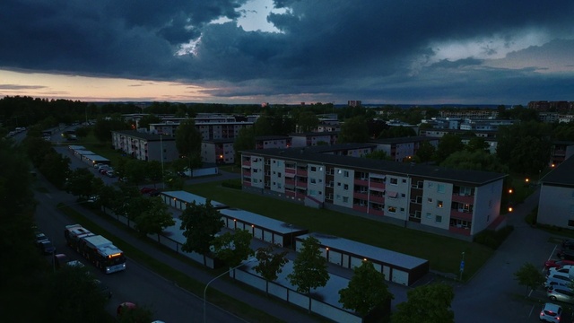 Video Reference: Cloud, Sky, Plant, Daytime, Building, Window, Tree, Vehicle, Dusk, Urban design