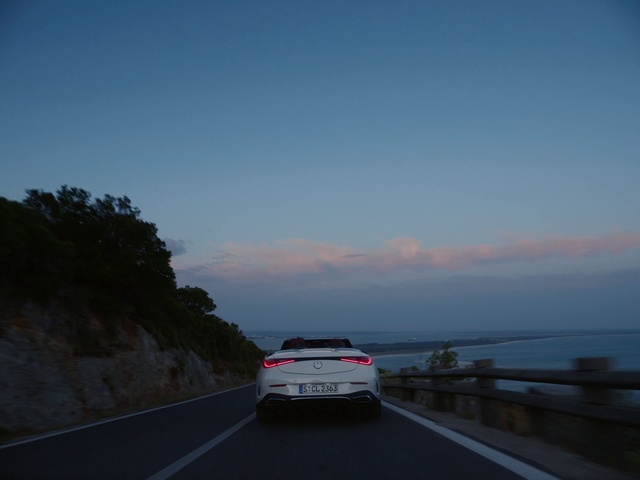 Video Reference: Sky, Car, Cloud, Vehicle, Automotive lighting, Road surface, Automotive design, Automotive exterior, Vehicle registration plate, Asphalt