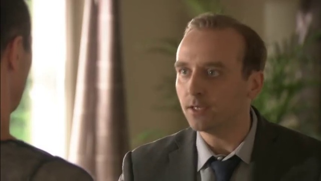 Video Reference: Forehead, Hairstyle, Flash photography, Gesture, Dress shirt, Collar, Tie, Blazer, Suit, Formal wear