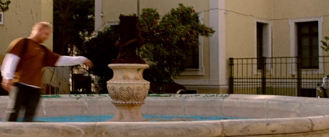 Video Reference: Water, Plant, Flowerpot, Font, Wall, Building, Fountain, Tints and shades, Leisure, Road