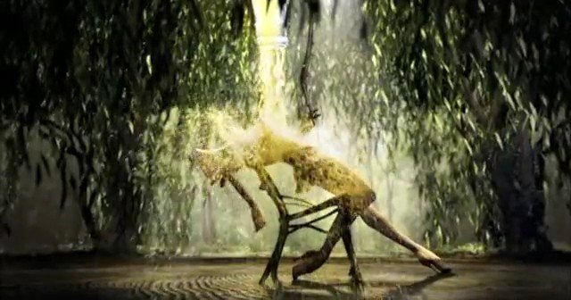 Video Reference: dance, dancer, performance, stage, theater, yellow costume, pose, movement, foliage, spotlight, artistic, dramatic, choreography