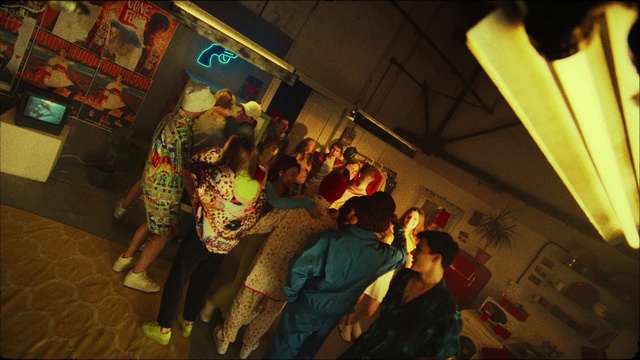 Video Reference: Leisure, Chair, Event, Fun, Crowd, Visual arts, Night, Room, City, T-shirt