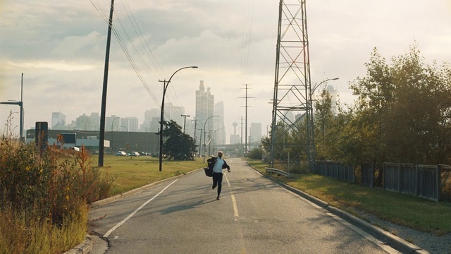 Video Reference: Sky, Cloud, Plant, Infrastructure, Road surface, Street light, Asphalt, Electricity, Architecture, Building