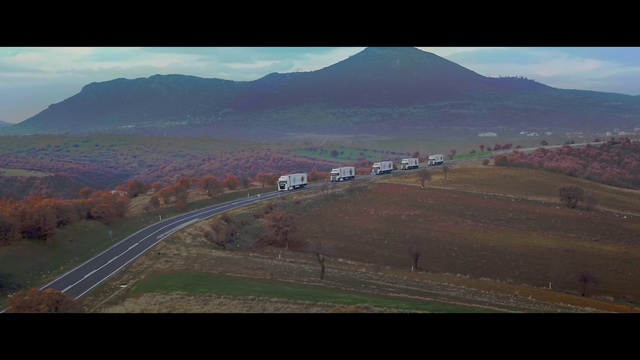 Video Reference: Mountain, Sky, Cloud, Highland, Natural landscape, Land lot, Slope, Grass, Atmospheric phenomenon, Plant