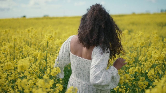 Video Reference: Hair, Flower, Plant, Photograph, Sky, People in nature, Yellow, Dress, Happy, Grass