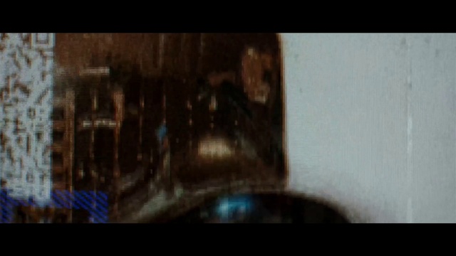 Video Reference: Automotive lighting, Jaw, Wood, Tints and shades, Eyelash, Font, Glass, Art, Electric blue, Transparent material