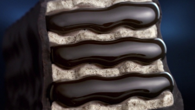 Video Reference: Hair, Jaw, Rectangle, Liquid, Baked goods, Tints and shades, Cuisine, Pattern, Electric blue, Carmine