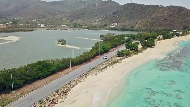 Video Reference: Water, Water resources, Mountain, Sky, Coastal and oceanic landforms, Tree, Bank, Beach, Landscape, Waterway