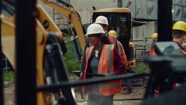 Video Reference: Hard hat, Helmet, Workwear, High-visibility clothing, Tradesman, Engineer, Construction worker, Headgear, Asphalt, Blue-collar worker
