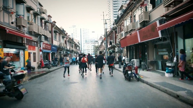 Video Reference: Sky, Building, Window, Tire, Cloud, Road surface, Travel, Thoroughfare, Wheel, Neighbourhood