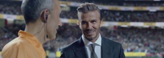 Video Reference: Forehead, Chin, Smile, Shirt, Dress shirt, Gesture, Collar, Tie, Blazer, Suit