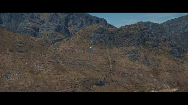 Video Reference: Mountain, Sky, Bedrock, Slope, Terrain, Formation, Outcrop, Landscape, Valley, Fault