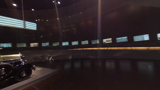 Video Reference: Tire, Wheel, Automotive lighting, Vehicle, Flooring, Floor, Building, Tints and shades, Automotive tire, City