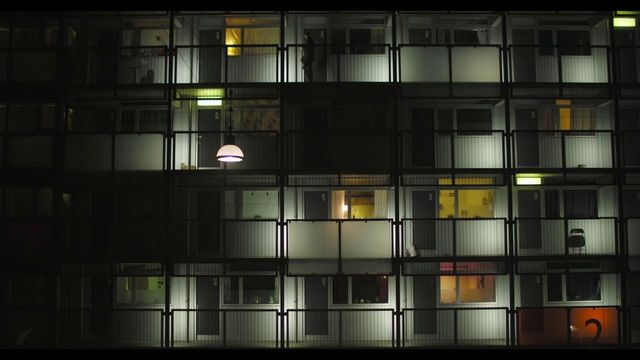 Video Reference: Building, Rectangle, Window, Material property, Urban design, Facade, Symmetry, Tints and shades, Condominium, Electricity