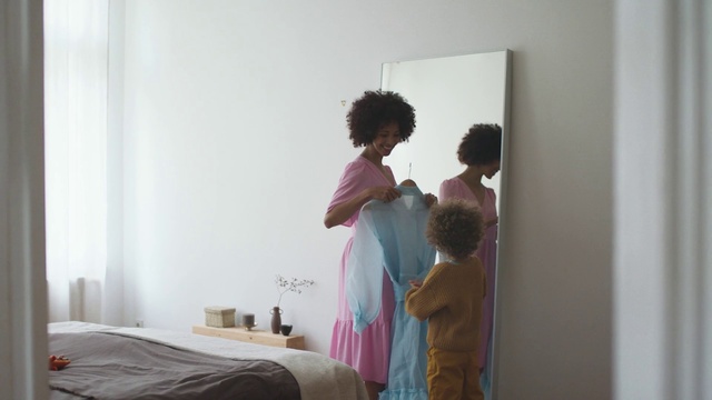 Video Reference: Comfort, Art, Fashion design, Event, Magenta, Linens, Bed, Bed frame, T-shirt, Curtain