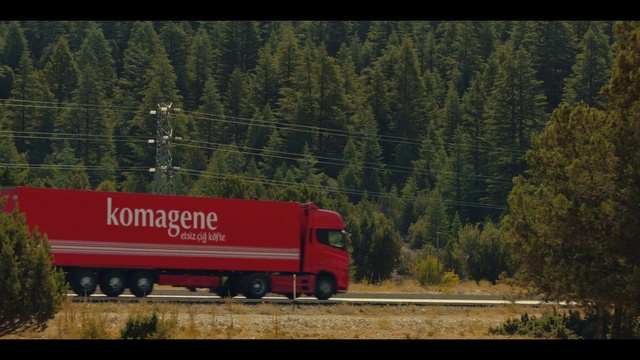 Video Reference: Wheel, Plant, Tire, Vehicle, Truck, Motor vehicle, Tree, Rolling, Commercial vehicle, Automotive exterior