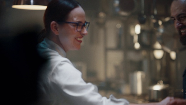 Video Reference: Glasses, Vision care, Eyewear, Smile, Flash photography, Cooking, Event, White-collar worker, Science, Sleeve