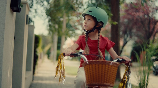 Video Reference: Helmet, People in nature, Happy, Yellow, Plant, Bicycle basket, Leisure, Basket, Toddler, Fun