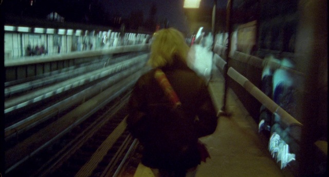 Video Reference: Standing, Automotive lighting, Wood, Tints and shades, Travel, Public transport, Flooring, Track, Road, Passenger