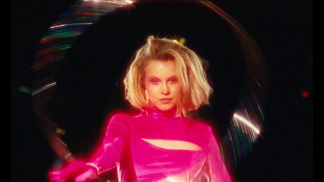 Video Reference: Lip, Human, Flash photography, Entertainment, Black hair, Fun, Eyelash, Magenta, Fashion design, Event