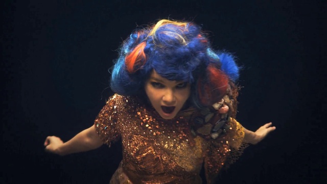 Video Reference: Dress, Flash photography, Purple, Artist, Musician, Performing arts, Music, Music artist, Entertainment, Glove