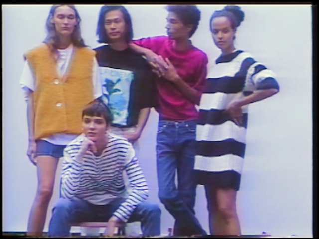 Video Reference: Hair, Face, Purple, Sleeve, Gesture, Happy, Entertainment, Fashion design, Magenta, Performing arts