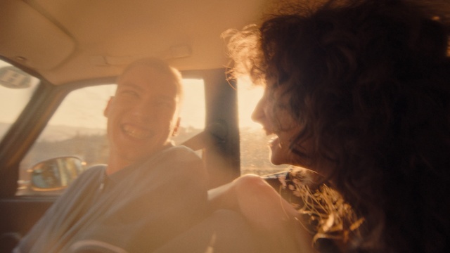 Video Reference: Nose, Face, Chin, Eyebrow, Mouth, Jaw, Flash photography, Dress, Eyelash, Gesture