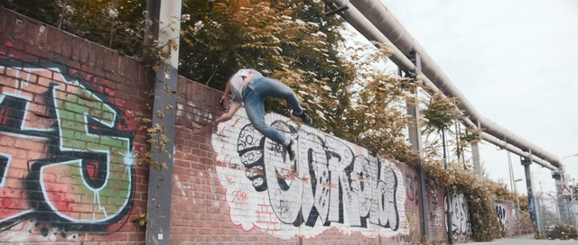 Video Reference: Art, Rolling, Graffiti, Handwriting, Sports equipment, Font, Stunt performer, Stunt, Recreation, City