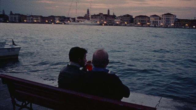 Video Reference: Water, Sky, Cloud, Dusk, Body of water, Lake, Horizon, Morning, Sunset, City