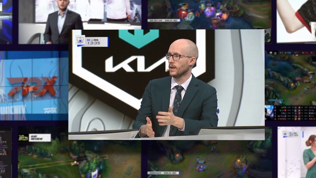 Video Reference: World, Product, Coat, Gadget, News, Flat panel display, Television set, Suit, Community, Output device