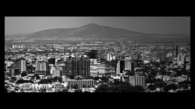 Video Reference: Sky, Building, Atmosphere, Skyscraper, World, Black, Black-and-white, Style, Atmospheric phenomenon, Tower block