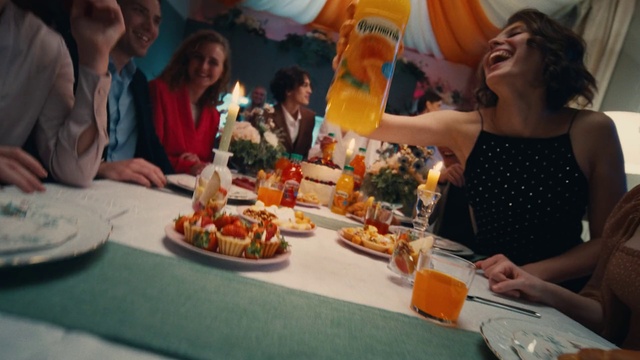 Video Reference: Food, Table, Tableware, Smile, Orange, Plate, Sharing, Social group, Community, Fun