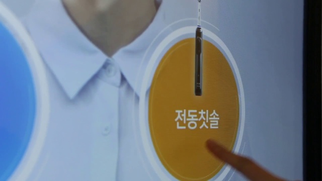 Video Reference: Dress shirt, Sleeve, Musical instrument, String instrument, Collar, Stethoscope, Font, Electric blue, Circle, Jewellery