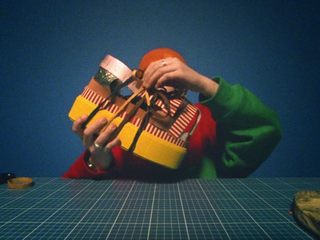 Video Reference: Musical instrument, Guitar accessory, Wood, Toy, String instrument accessory, Folk instrument, Wrist, Plucked string instruments, Thumb, String instrument