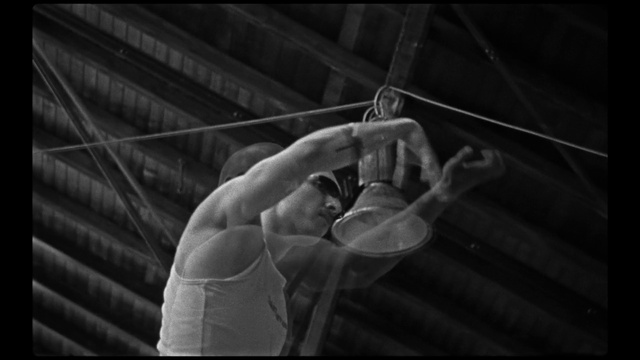 Video Reference: Human body, Flash photography, Gesture, Style, Black-and-white, Elbow, Chest, Performing arts, Entertainment, Monochrome