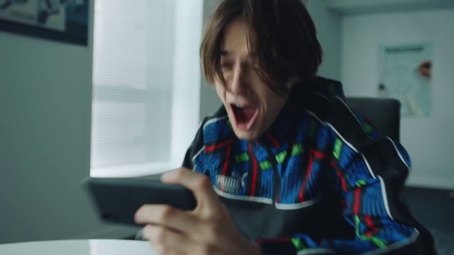 Video Reference: Smile, Gesture, Finger, Gadget, Mobile phone, Fun, Plaid, Electronic device, Happy, Thumb