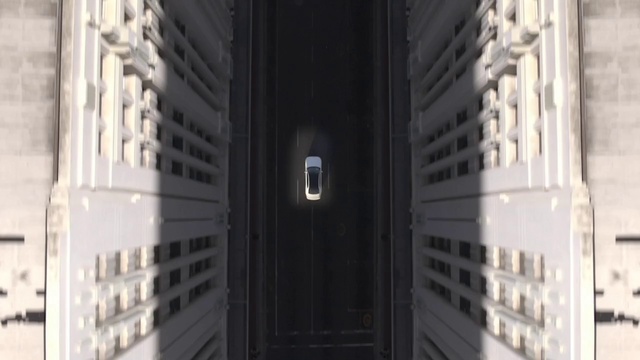 Video Reference: Automotive tire, Automotive design, Building, Engineering, Font, Facade, Tower block, City, Symmetry, Technology