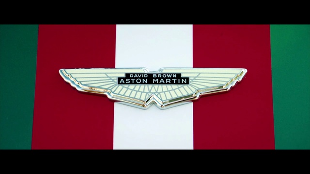 Video Reference: Motor vehicle, Badge, Rectangle, Font, Emblem, Symbol, Fashion accessory, Triangle, Graphics, Crest