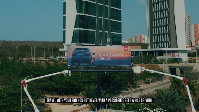 Video Reference: Building, Plant, Vehicle, Car, Sky, Skyscraper, Tire, Tree, Motor vehicle, Urban design
