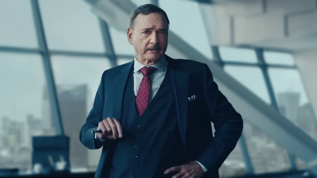 Video Reference: Dress shirt, Tie, Sleeve, Gesture, Collar, Blazer, White-collar worker, Suit, Formal wear, Event