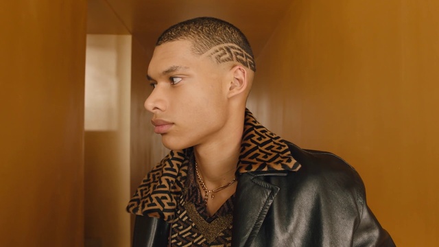 Video Reference: Chin, Eyebrow, Neck, Sleeve, Fashion design, Event, Formal wear, Art, Eyewear, Street fashion