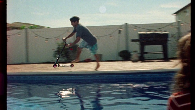 Video Reference: Water, Shorts, Sky, Light, Swimming pool, Leisure, Fun, Recreation, Sports equipment, Asphalt