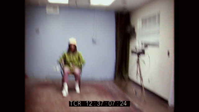 Video Reference: Flash photography, Flooring, Font, Wood, Ceiling, Room, Helmet, Personal protective equipment, Visual arts, Magenta