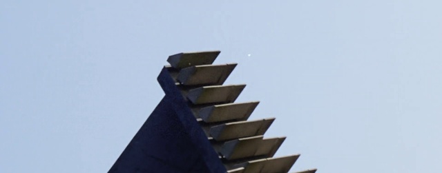 Video Reference: Sky, Composite material, Art, Facade, Electric blue, Rectangle, Metal, Urban design, Symmetry, City