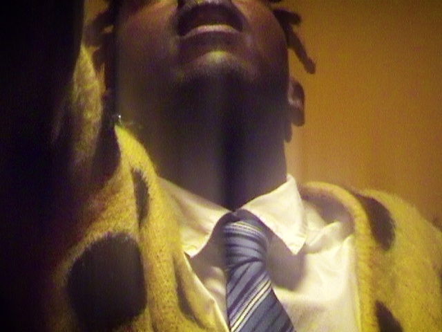 Video Reference: Vision care, Tie, Jaw, Neck, Flash photography, Gesture, Beard, Eyewear, Facial hair, Fashion design