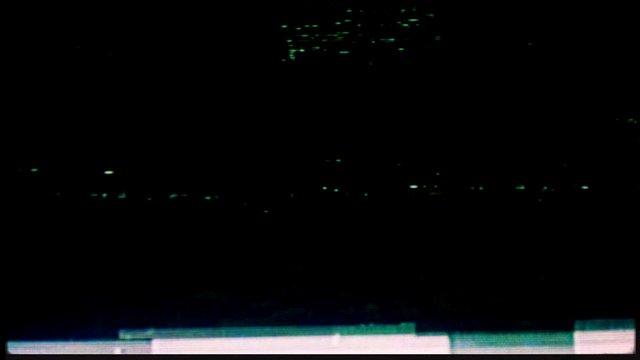 Video Reference: dark, noisy, abstract, glitch, lights, digital, artifact, black background, low light, static, flicker, grain