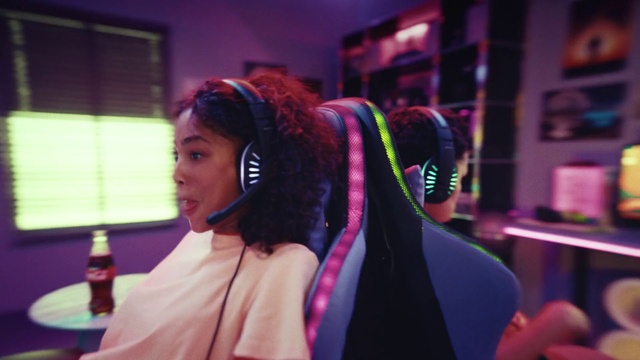 Video Reference: Purple, Eyewear, Entertainment, Gadget, Audio equipment, Flash photography, Magenta, Fashion design, Black hair, Leisure