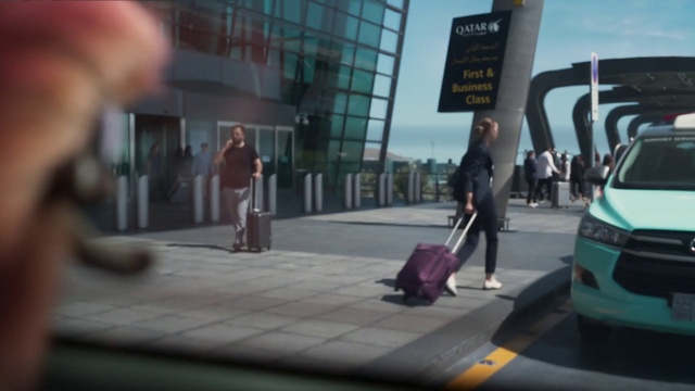 Video Reference: Car, Asphalt, Automotive lighting, Road surface, Automotive design, City, Road, Motor vehicle, Sidewalk, Street fashion