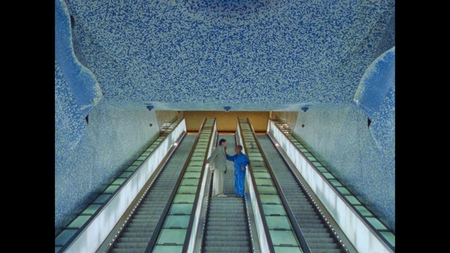 Video Reference: World, Azure, Building, Stairs, Escalator, Line, Aqua, Window, Symmetry, Leisure