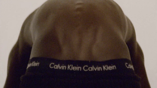 Video Reference: Head, Outerwear, Cap, Sleeve, Headgear, Jacket, Font, Fur, Fashion accessory, Hat